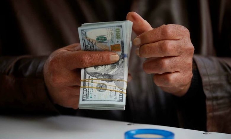 العراق تحظر عمليات السحب النقدي بالدولار